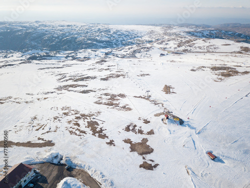 Aerial view of the landscape covered by snow on Torre in Serra da Estrela. Famous ski destinations in Portugal. Manteigas, Portugal