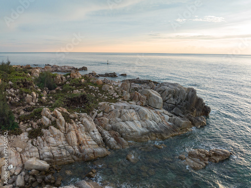 Rocks in the middle corner of Qizi Bay, Changjiang, Hainan, China photo