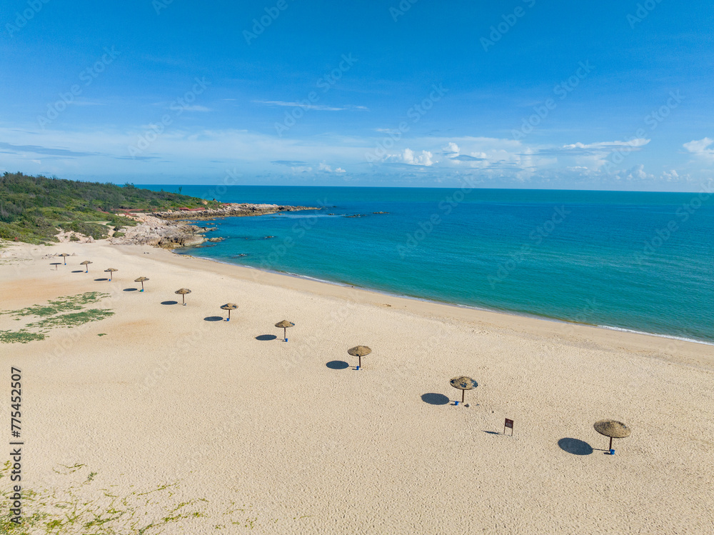 Summer sunny beach at Qiziwan, Changjiang, Hainan, China Summer sunny beach at Qiziwan, Changjiang, Hainan, China
