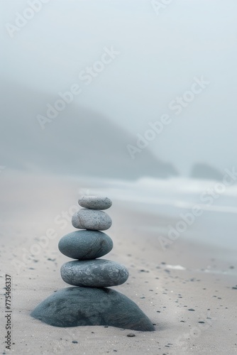 Minimalist  abstract background  Stack of rocks on a sandy beach  simple and minimalist scene against the backdrop of the shore