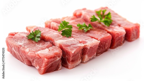 Raw sliced port meat being prepared on a plain white background. 