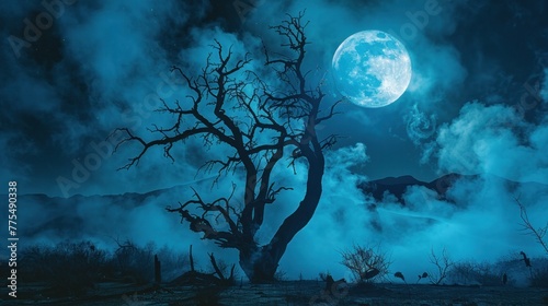 Ethereal Halloween scene. Full moon casts an eerie glow over a barren tree.