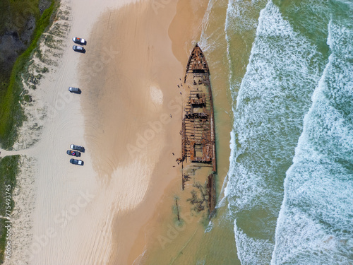 Aerial view of the S.S. Maheno Shipwreck along 75 mile beach on the sand island of K’gari, Queensland, Australia