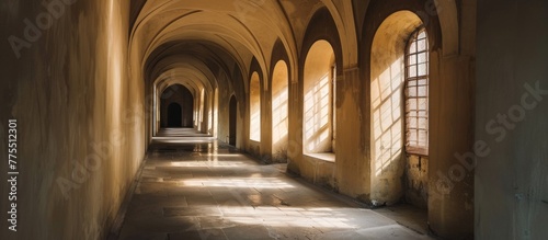 Corridor with arched windows in a stone building