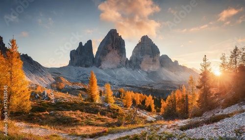 gloomy autumn view of tre cime di lavaredo national park with orange larch trees fantastic morning scene of dolomite alps auronzo di cadore italy europe beauty of nature concept background photo