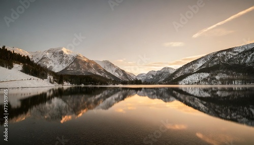 snowy mountain reflection at night in the lake