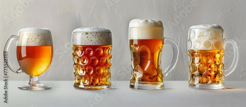 Three glasses of beer are lined up on a table