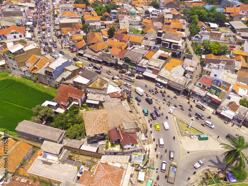 Congestion due to Eid homecoming traffic. Top view of traffic jam at road junction, Bandung - Indonesia. Transportation Industry. Above. Inter-city road access. Shot from a drone.