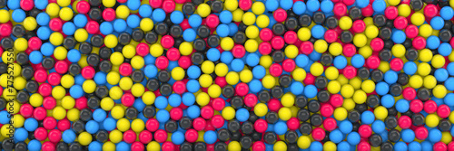 3d rendering of many colored spheres in cmyk - abstact background.