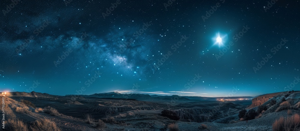 Stars shining over a mountain range
