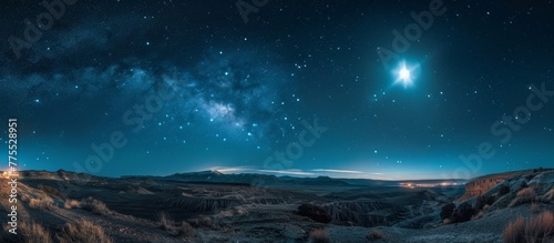 Stars shining over a mountain range