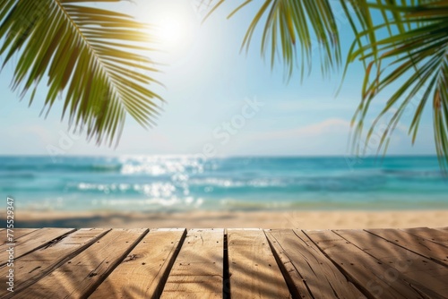 Wooden table overlooking the sea  palm trees and bokeh - blurry light of the sea and sky against the backdrop of a tropical beach. Empty space for product display