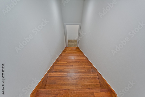 A bright, autumn-colored staircase that goes well with the interior