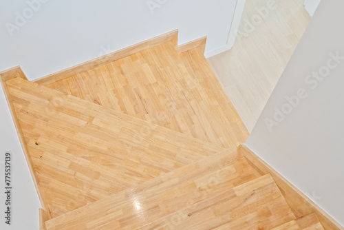 Neat, stylish and pretty bright color wooden colored stairs