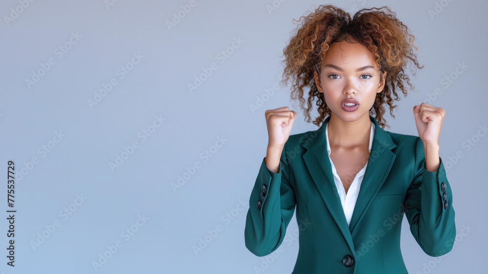 African Business Woman in green suit celebrate win, smile and raised hands