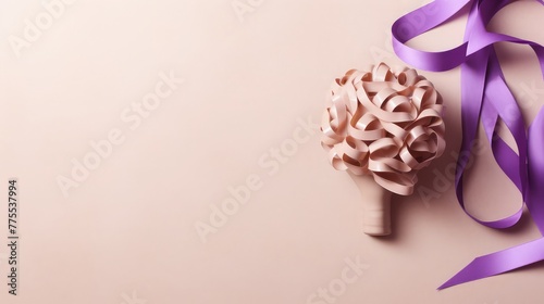 Human head cutout with brain near purple ribbon on beige background, flat lay. Epilepsy awareness photo