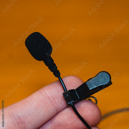 hand with microphone