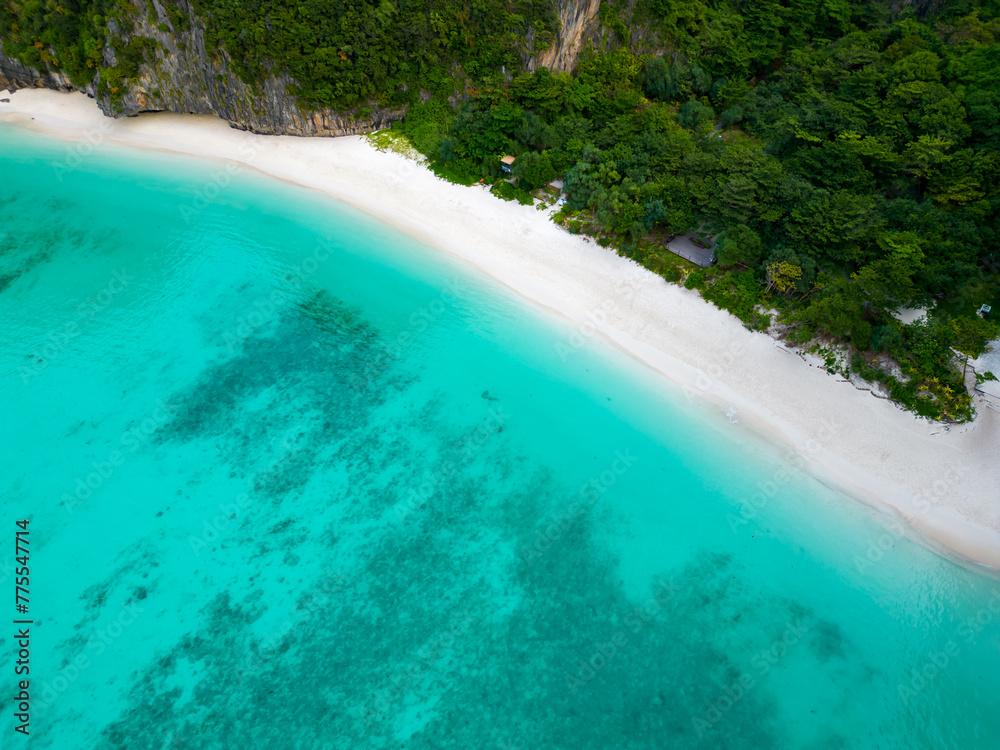 Aerial view of a tropical Maya bay beach with turquoise water and white sand Aerial view of a tropical Maya bay beach with turquoise water and white sand