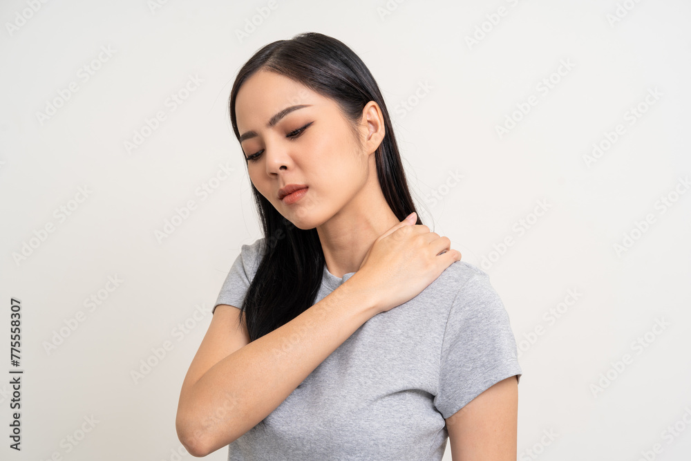 Asian woman has problem with structural posture She had neck and shoulder pain. She massaged her neck and shoulders for relief. reduce muscle tension. Unwell unhealthy on isolated white background Asian woman has problem with structural posture She had neck and shoulder pain. She massaged her neck and shoulders for relief. reduce muscle tension. Unwell unhealthy on isolated white background