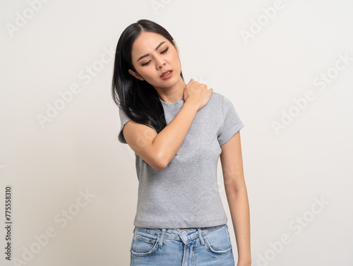 Asian woman has problem with structural posture She had neck and shoulder pain. She massaged her neck and shoulders for relief. reduce muscle tension. Unwell unhealthy on isolated white background