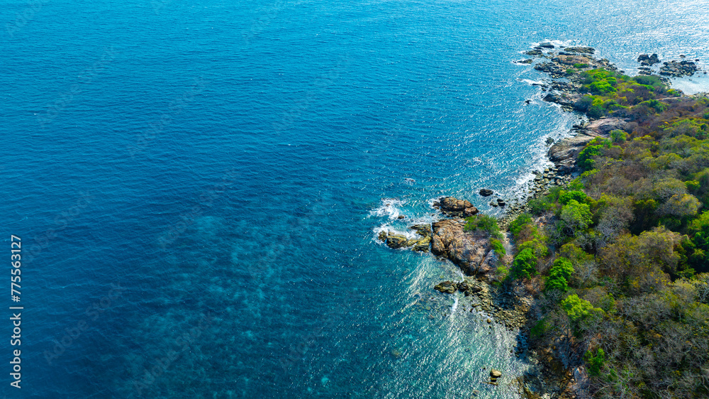 Aerial view of islands, Andaman Sea, natural blue waters and forests, tropical sea of Thailand. Beautiful scenery of the island with beautiful nature. Aerial view of islands, Andaman Sea, natural blue waters and forests, tropical sea of Thailand. Beautiful scenery of the island with beautiful nature.