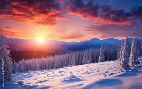 Sunrise over a snow-covered mountain range © Muh