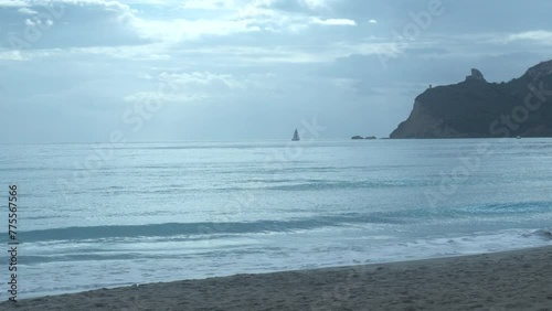 a sailboat sailing over the horizon