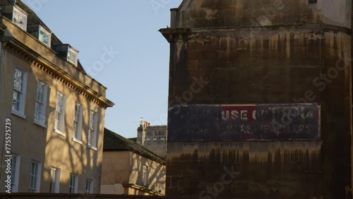 Ghost Signages In The Ruined Walls Of Old Building In Bath, Somerset, England, UK. Static Shot photo