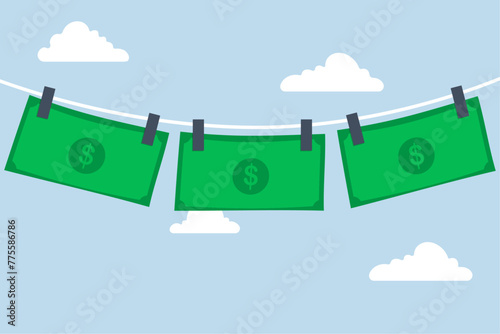 Money laundering and financial crime, US dollar  hanging dry after washing or laundering metaphor for money laundering.