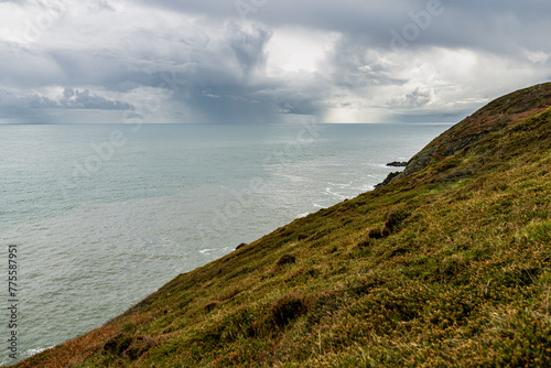 Howth Cliffs, Dublin, Ireland. Cloudy landscape with Ireland coastline and North Sea. Howth Cliffs Walk. photo