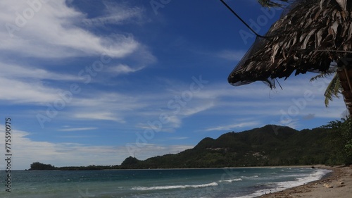 View of the waves on the beach in Majene Indonesia photo