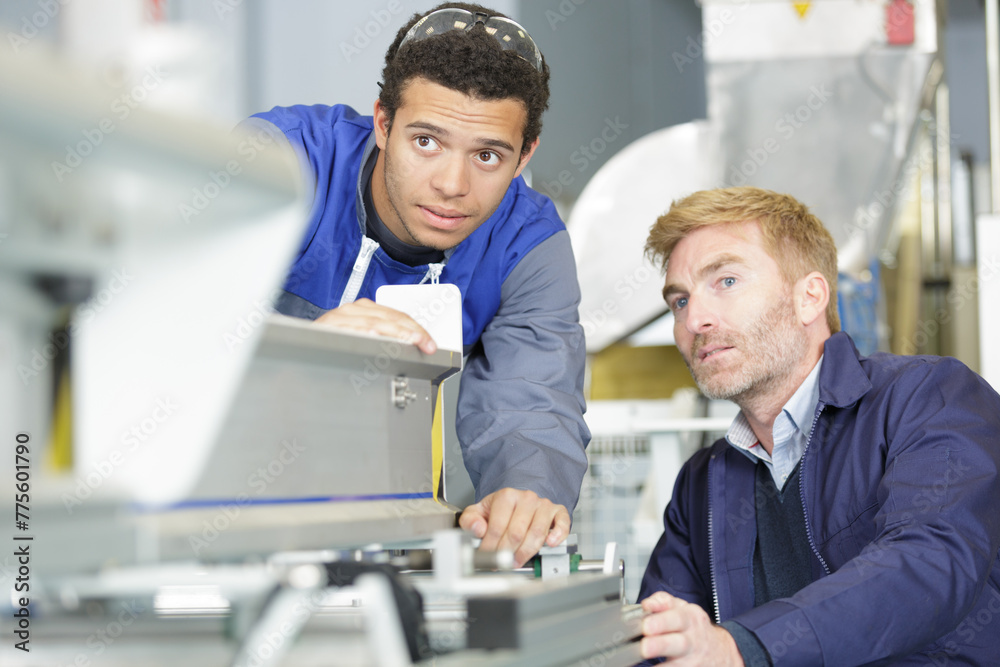 two men different ages professional labours two men different ages professional labours