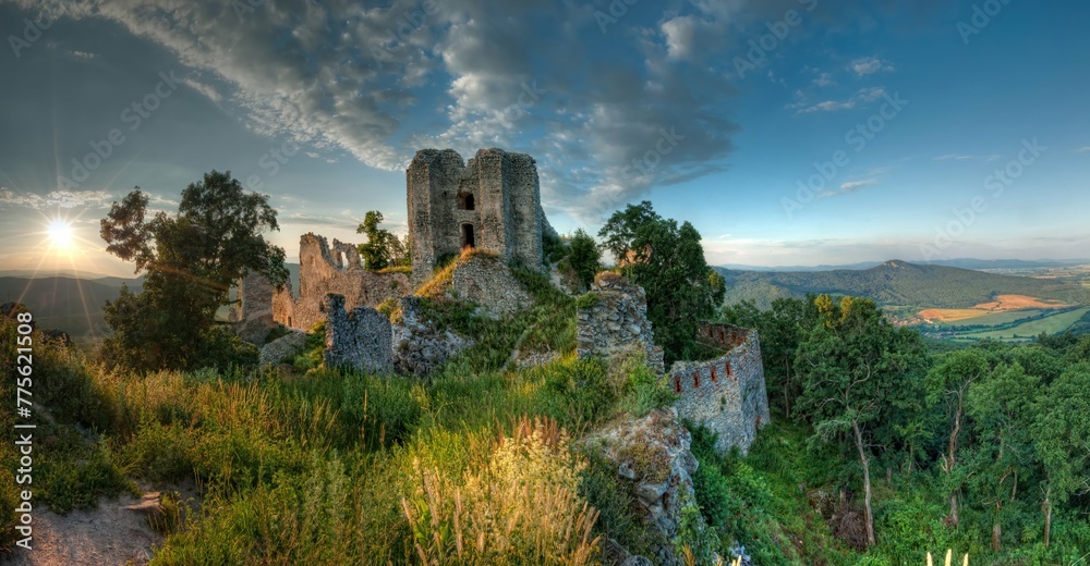 The old fortified castle, a historical ruin of a medieval castle. Ruin of castle Gymes at sunset, History of old Europe.
