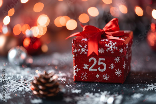 Red festive christmas present box with 25 number on it for December 25 Christmas day photo