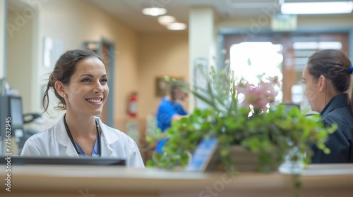 Smiling reception behind front desk