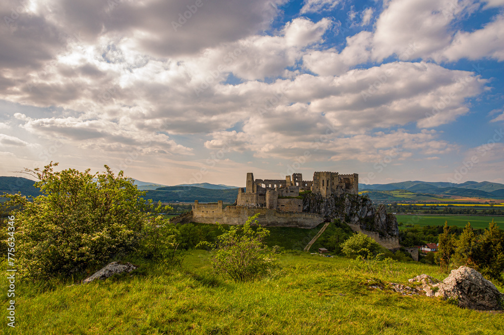 Medieval castle Beckov with surrounding landscape on a spring sunny day, Slovakia, Europe. Discover the history of European castles