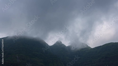 Timelapse of clouds dancing on a mountain during rainy season. Shot in 4K ultra HD 60 fps for the smoothest and clearest video.