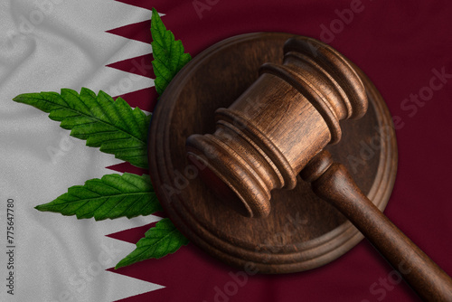 Gavel and Cannabis leaf on the Qatar flag - legalization of the cannabis concept