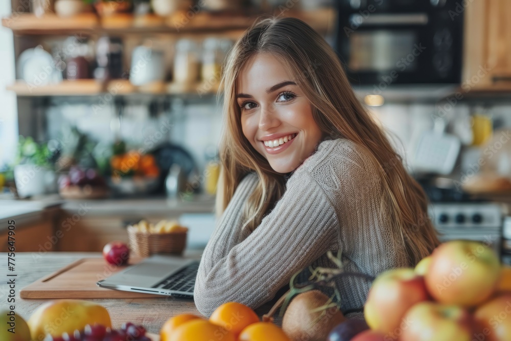 Dash Drive: With A Determined Gaze, A Young Woman Works Diligently On Her Laptop, Complemented By A Colorful Assortment Of Fruits, Following The Dash Diet For Optimal Health