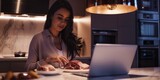 Protein-Powered Productivity: Serene And Composed, A Young Woman Works On Her Laptop Amidst The Aroma Of Cooked Meat, Reflecting Her Dedication To A High-Protein Lifestyle