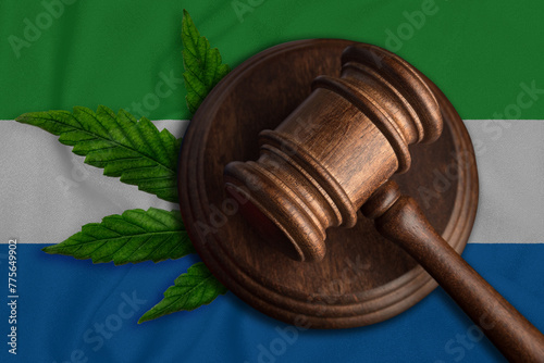 Judges gavel and cannabis leaf on the flag of Sierra Leone