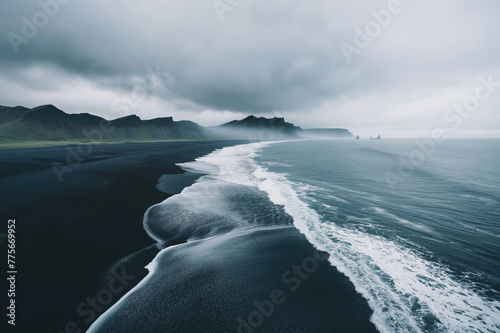 Scenic Icelandic landscape with black sand beach and Atlantic ocean. Majestic nature of Iceland.