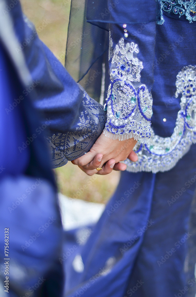 Young married couple holding hands, ceremony wedding day. Wedding Couple Nice Hands.