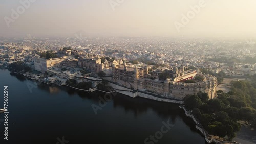 An aerial view of Lake Pichola with a City Palace view in Udaipur in the morning. The city, famously known as the 