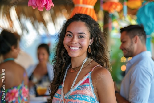 Joyful young woman smiling at a beach party with vibrant decorations in the background