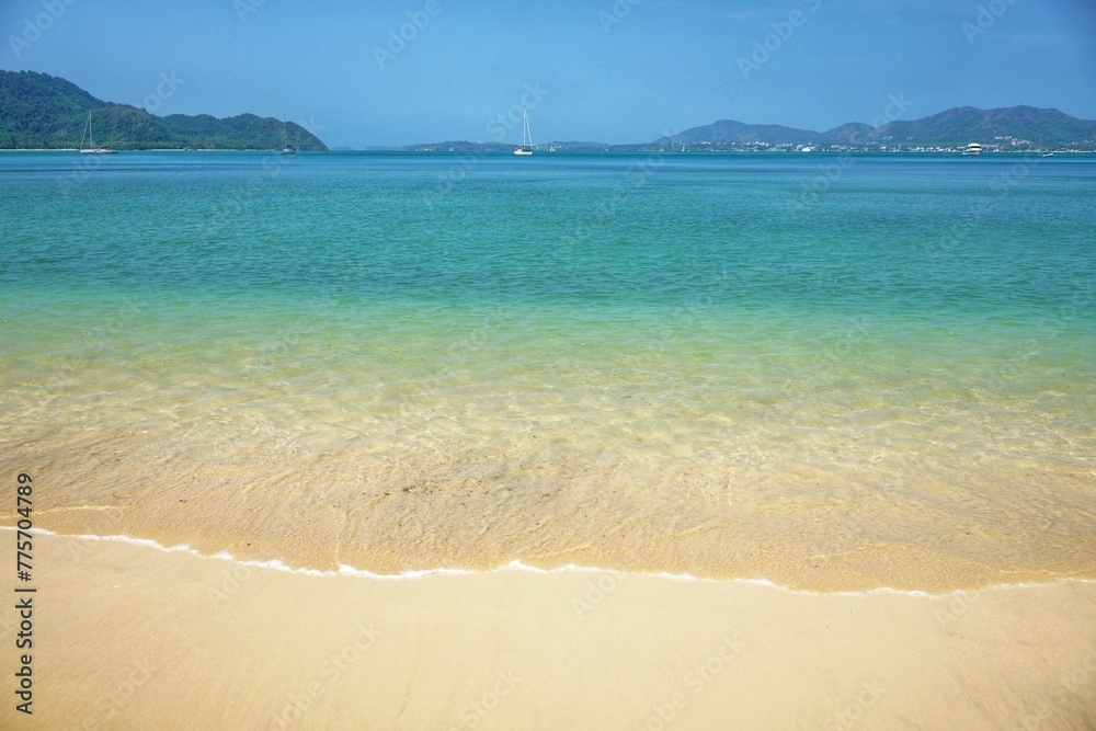 Phuket Thailand beach sea. Landscape view of beach sea and sand in summer sun. Beach space area background. 