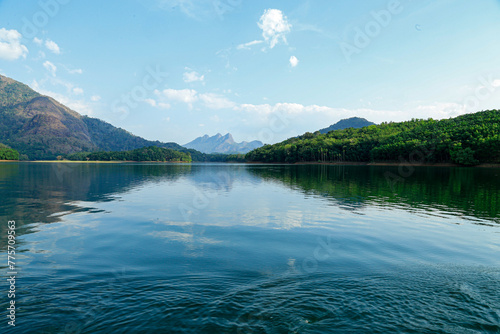 фотографія A fascinating view of Puravimala river surrounded by mountain and mangroves