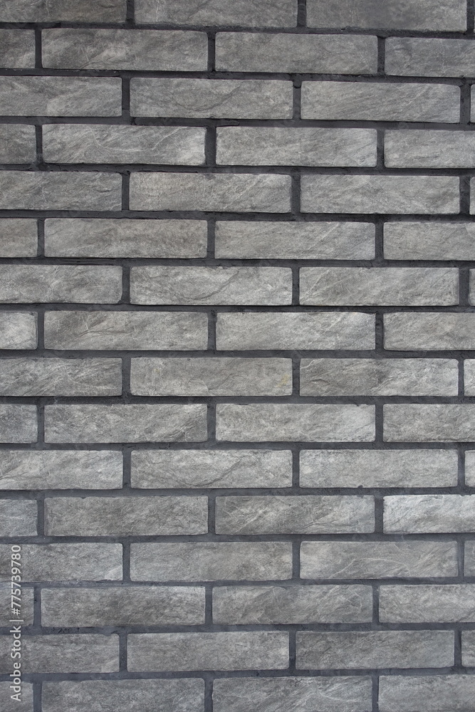 Loft style gray artificially aged brick veneer wall Loft style gray artificially aged brick veneer wall