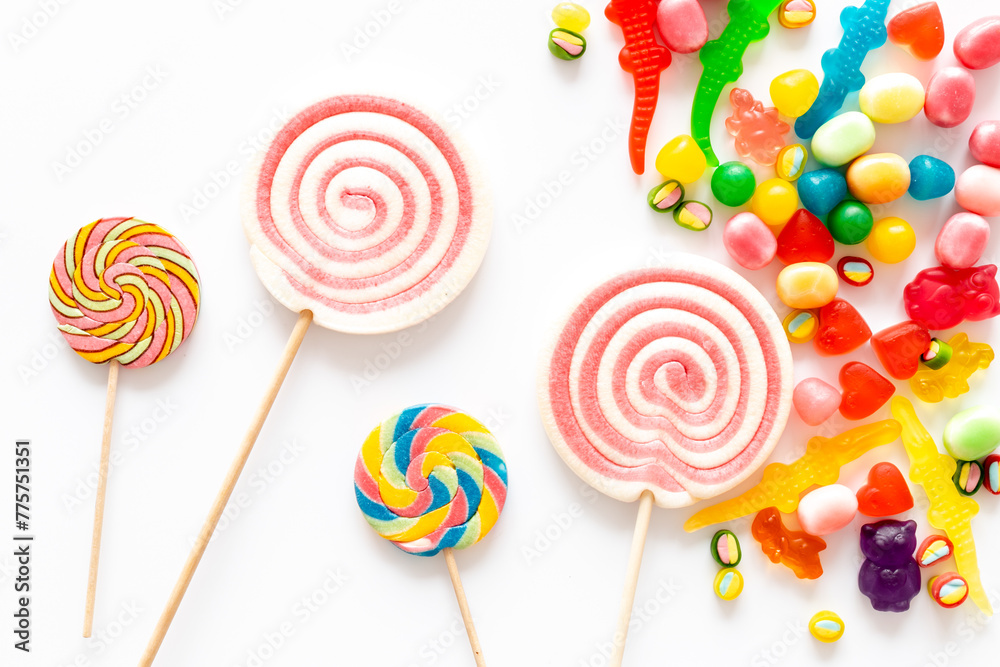 Set of colorful candies and lollipop. Sweet food and candies background Set of colorful candies and lollipop. Sweet food and candies background