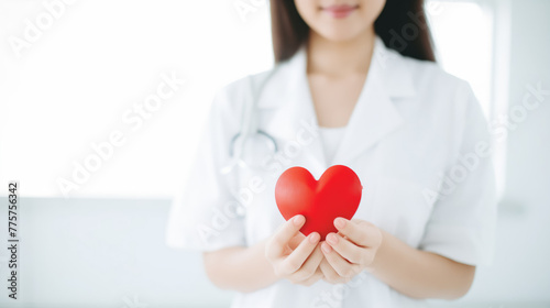 Compassionate nurse presents heart, emphasizing cardiac care, safety life